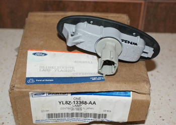 YL8Z-13368-AA KIERUNKOWSKAZ BŁOTNIKA LEWY FORD MAVERIC 01-07