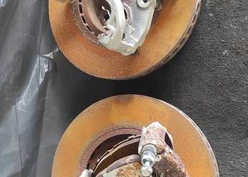 Zacisk hamulca tarczowego, przód lewy Subaru Outback V 14-20 26292AG053