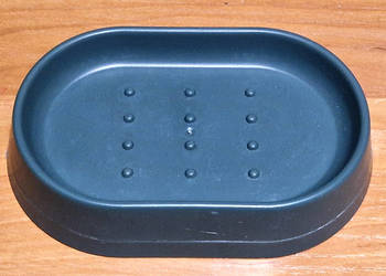 Zielona mydelniczka do postawienia na umywalce wannie