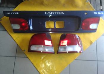 lampy tył lewa+prawa z listwą Hyundai Lantra r.92-96 sedan