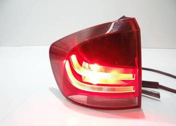 LAMPA LEWA TYLNA BMW X1 E84 OE 2990109