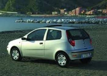 Szyba boczna drzwi błotnika tylnego tył Fiat Punto II 2 dwójka 99-