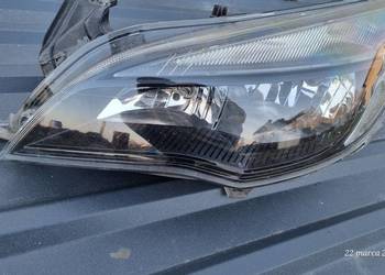 Reflektor Opel Astra J Lampa lewa