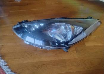 Mazda 2 07-14 lampa reflektor lewa przednia przód EU Orginał