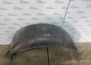 VOLKSWAGEN CADDY III nadkole lewe tył 2K5810971A 2K0810971E