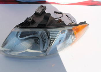 Reflektor lewy Dodge Caravan 01-07 r