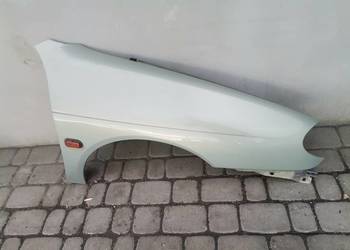 RENAULT MEGANE 1 FL BŁOTNIK PRAWY PRZEDNI MV931