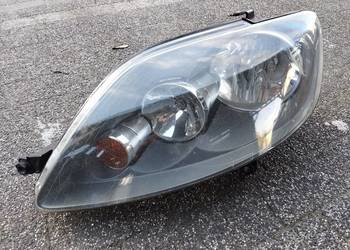 Lampa Vw Golf Plus lewy przód 5M1941005B czarny środek oryginał