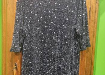 Przeźroczysta bluzeczka połyskująca srebrną nitką