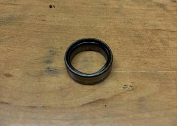 Tulejka z uszczelka wałka zdawczego Suzuki RM 250