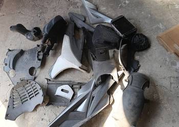 Kymco Xciting 400 owiewka części chłodnica plastik