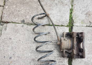 NISSAN NOTE E12 E 12 zacisk hamolcow praw przod