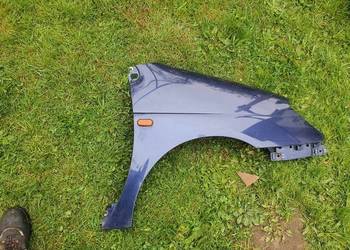 Błotnik prawy granatowy Renault Scenic I lift 99-