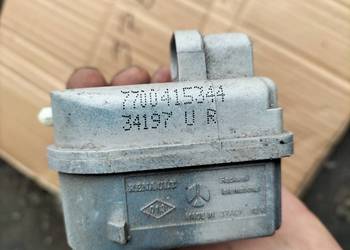 SILNICZEK REGULACJI LAMPY Renault Clio 1 7700415344