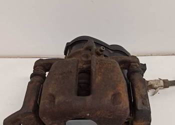 AUDI AA4 B8 ZACISK HAMULCOWY LEWY TYŁ 8K0615403E