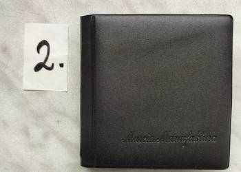 Album/klaser z monetami.