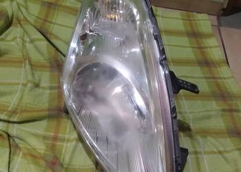 SUZUKI SWIFT 10- LAMPA PRAWA PRZEDNIA P9121 H7 EU