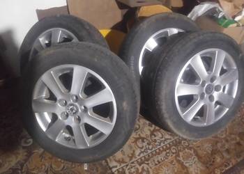 sprzedam felgi aluminiowe 15 do samochodu skoda fabia II z oponami