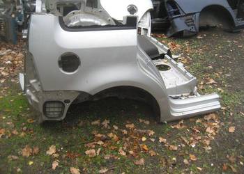 vw touran 03-09r błotnik tył prawy kod lakieru LA7W