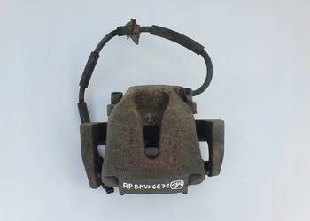 BMW X6 E71 X5 E70 PRAWY ZACISK HAMULCOWY Przód