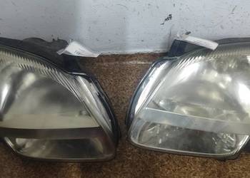 Subaru justy lampy przód lewa i prawa
