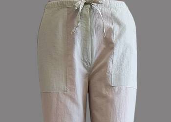 Damskie spodnie z tkaniny z prostymi nogawkami w kolorze ecru Djuk sport 38