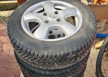 Felgi aluminiowe Nissan z oponami Kormoran
