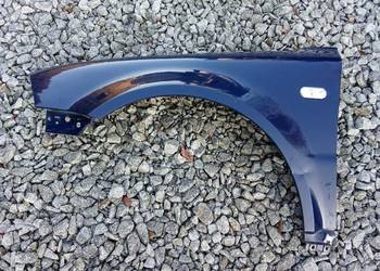 VW Passat B5 fl/ błotnik przedni lewy orginal / KOD.LAK./LA5E