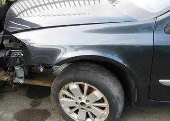 BŁOTNIK LEWY PRZÓD RENAULT LAGUNA II LIFT TEB66.   ORYGINAŁ