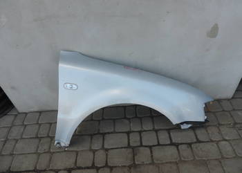 BŁOTNIK PRAWY PRZÓD VW PASSAT B5 LB7Z