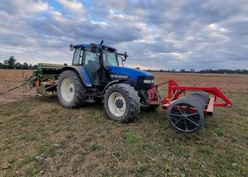 New Holland Tm 115, przedni tuz , likwidacja