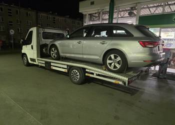 Auto pomoc laweta pomoc drogowa awari holowanie odpalanie auta Katowice