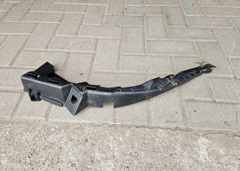 VW PASSAT B5 ŚLIZG LEWY UCHWYT POD LAMPE 3B0807049C