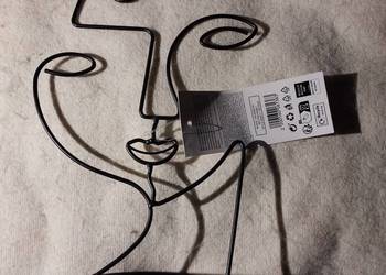 stojak na pierścionki- biżuterię  metal twarz Nowa