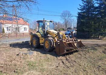 Komatsu wb97s z 2004r sprowadzona