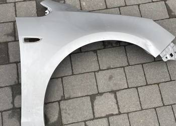 Opel astra J IV błotnik przód prawy