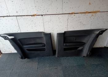 Audi A3 8P - boczki tapicerki tylne komplet hatchback trzy drzwi