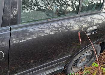Drzwi lewe lewy tył nissan Almera n16 kolor Z11