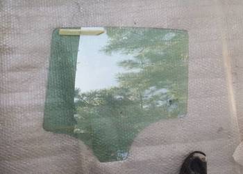 Corsa D  szyba  tył lewa 5D