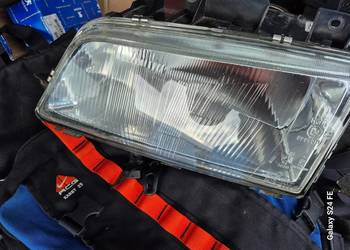 Peugeot 405 oryginalny lewy reflektor CIBIE Valeo