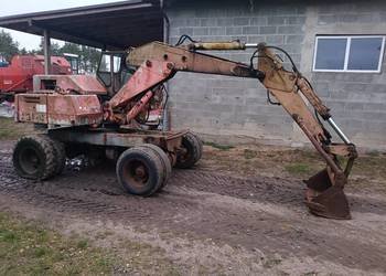 Koparka kołowa atlas 1302 silnik Deutz Cat New Holland Volvo