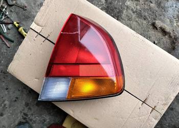 LAMPA TYŁ TYLNA PRAWA  MITSUBISHI CARISMA  MB944544