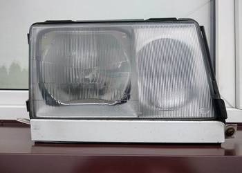 Mercedes W124 lampa przednia prawa reflektor przód pasażera oryginał Hella