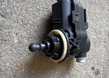 Silniczek regulacji lampy Nissan OE 90013783