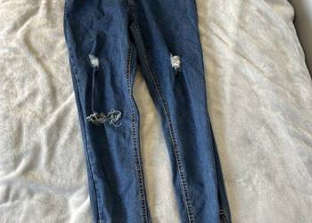 Dżinsy / jeansy niebieskie z dziurami skinny