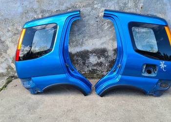 Suzuki Ignis MH SUBARU G3X JUSTY błotnik karoseria lewy tył