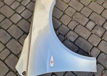 Błotnik Lancer 07- złoty S18 prawy