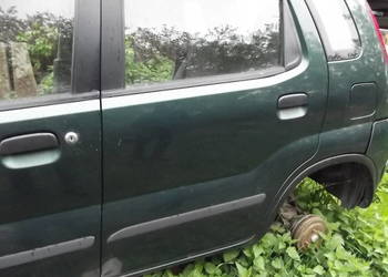 Suzuki Ignis I drzwi lewe tylne kpl.