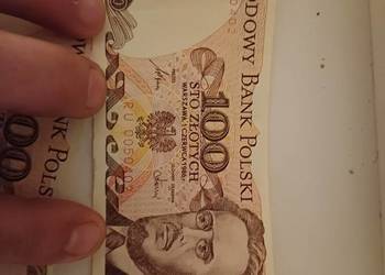 Dwa banknoty 100 złotowe z 1986 roku seria RU niski nr seryjny