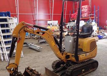 Caterpillar 300.9 najwyższy stan, niskie godziny
